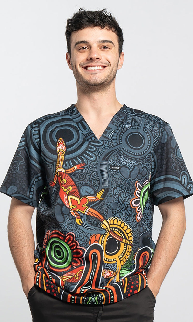 Aboriginal Art Unisex Three Pocket Scrub Top Proud & Deadly